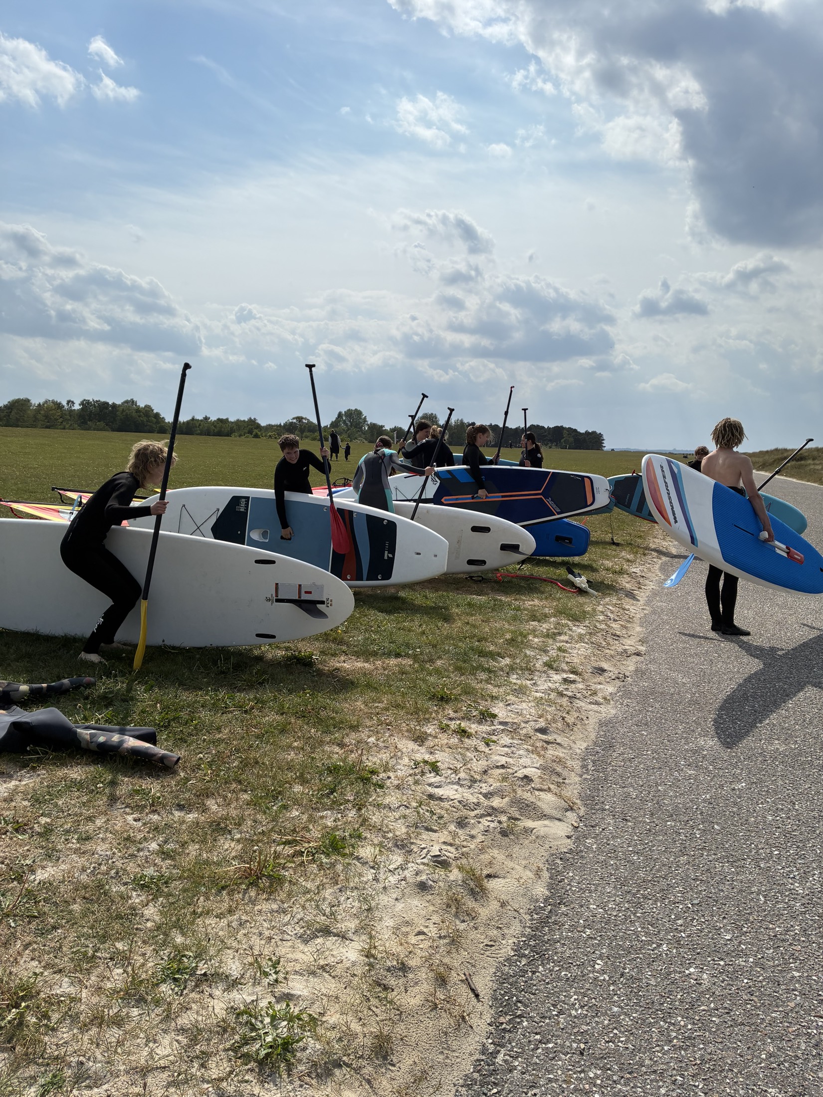 Blue Citizen group by the surf